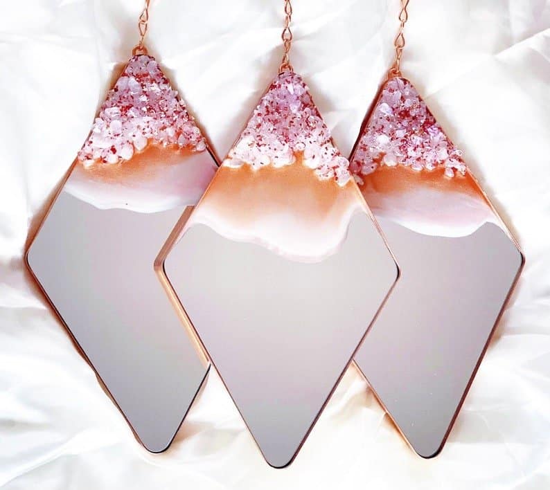 Rose gold geode mirrors as an example of bed room decor