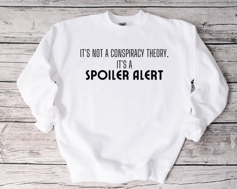 Shirts make great conspiracy theory gift ideas - this one says "it's not a conspiracy theory, it's a spoiler alert"
