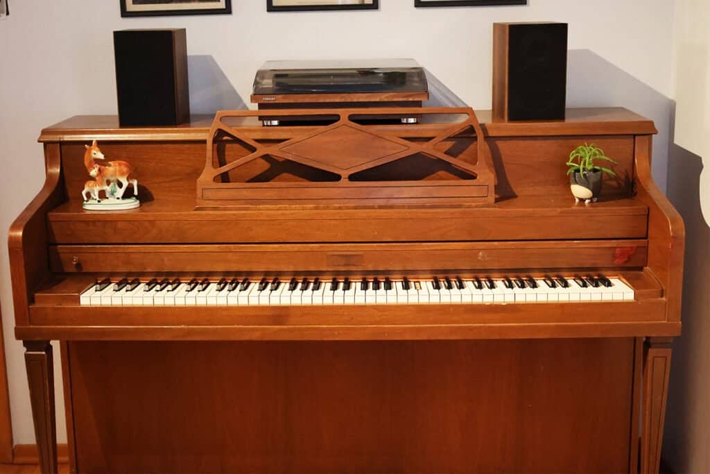 Old vintage upright piano from the 1970s