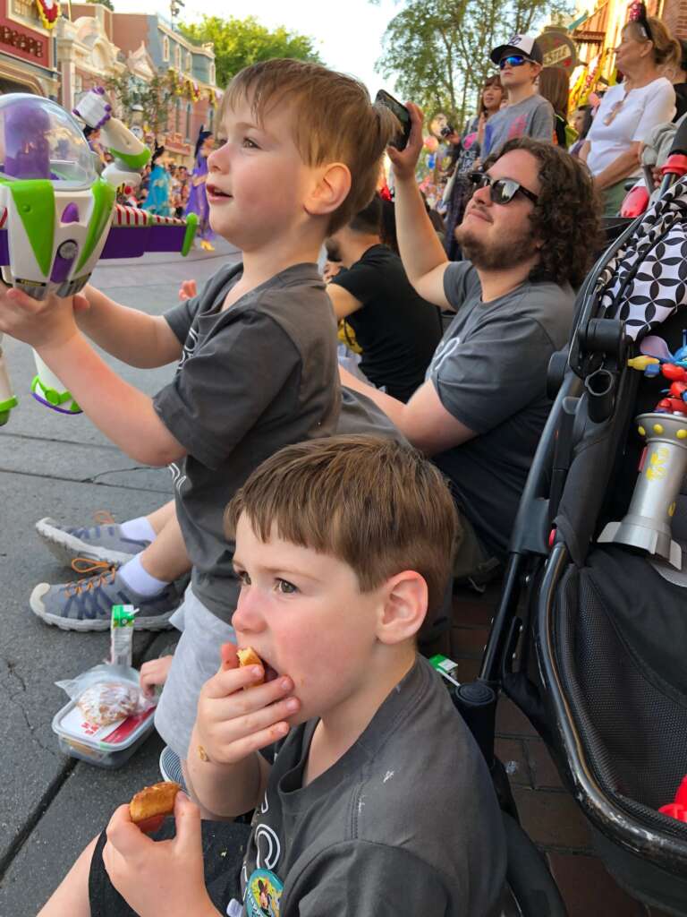 Eating snacks while waiting for the parade