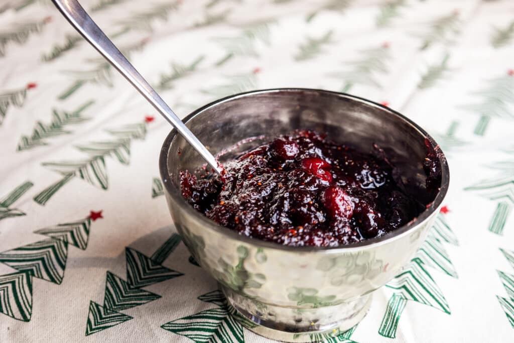 Instant pot cranberry sauce being served in a silver dish