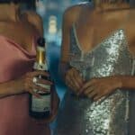 2 ladies in fancy dresses