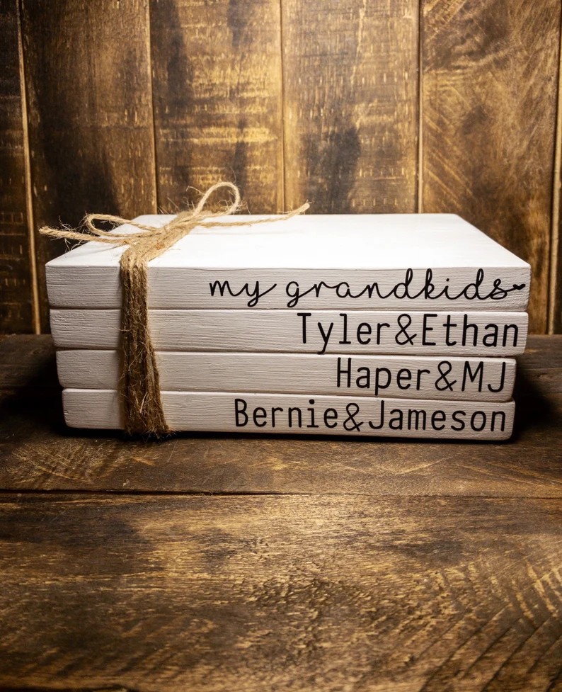 Wooden book stack with names